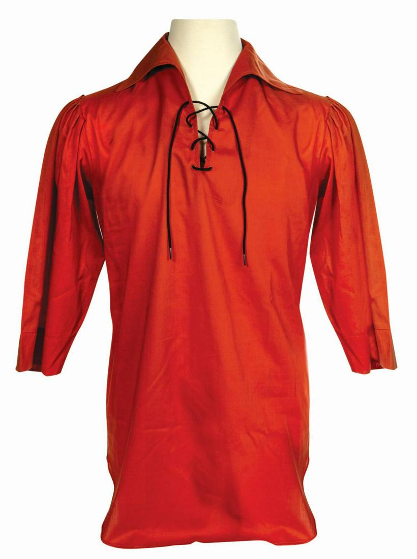 Walt Disney World Pirates Prototype Cast Member Shirt.: (Walt Disney World, 1973) A prototype for the cast member shirt for the Pirates of the Caribbean attraction at Walt Disney World. The interior of the neck retains a blank Magic Kingdom embroidered lab