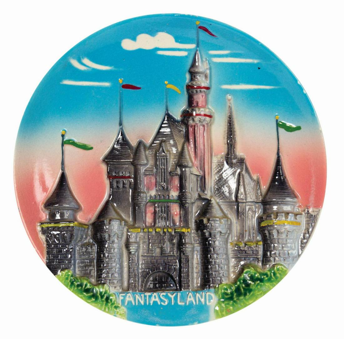 Fantasyland 3D Wall Plate.: (Disneyland, 1955) An early 3D souvenir wall plate from Disneyland. The painted and glazed ceramic plate features sculpted reliefs of Sleeping Beauty Castle, foreground foliage, and Fantasyland letter