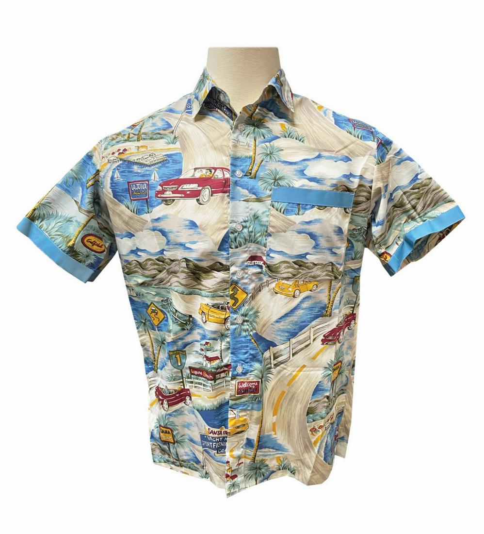 Mulholland Madness Cast Member Shirt.: (California Adventure, 2001) An original park used cast member shirt from California Adventure's Mulholland Madness attraction. The Hawaiian-style short sleeve shirt depicts illustrations of different
