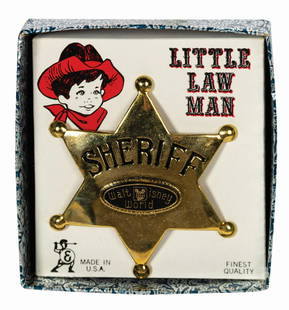 Little Law Man Sheriff Badge.: (Walt Disney World, c.1970s) A vintage Little Law Man Western sheriff badge souvenir from Walt Disney World's Magic Kingdom. The gold tone metal star-shaped pinback badge is engraved "Sheriff" with bl