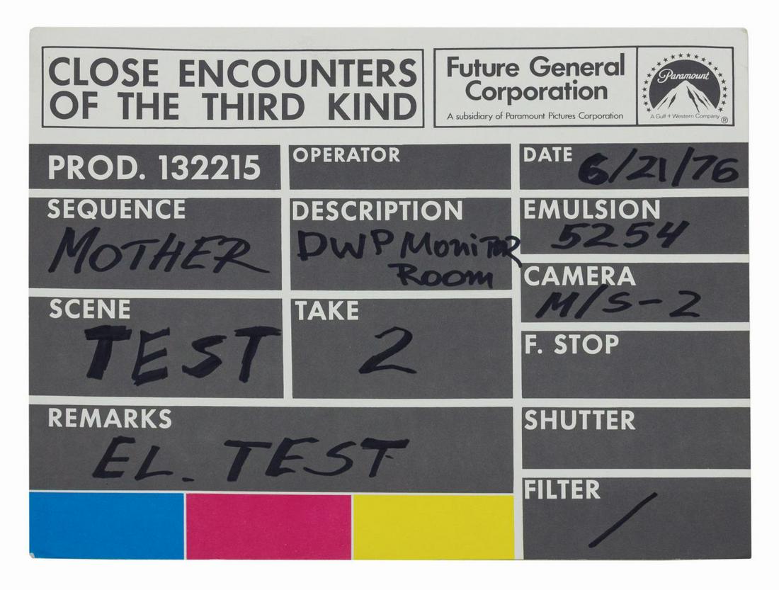 Close Encounters Mothership Paper Slate.: (Paramount, 1977) A paper filming slate from the early Steven Spielberg sci-fi classic, Close Encounters of the Third Kind, from the collection of a former studio employee. The cardstock slate has the
