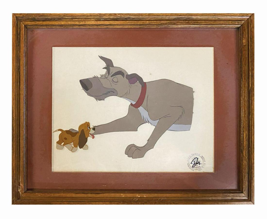 The Fox and the Hound Animation Cel.: (Disney, 1981) An original animation cel of Copper and Chief from The Fox and the Hound. The cel includes the studio's seal in the bottom-right and has a combined character image size of 8.5"x12" with