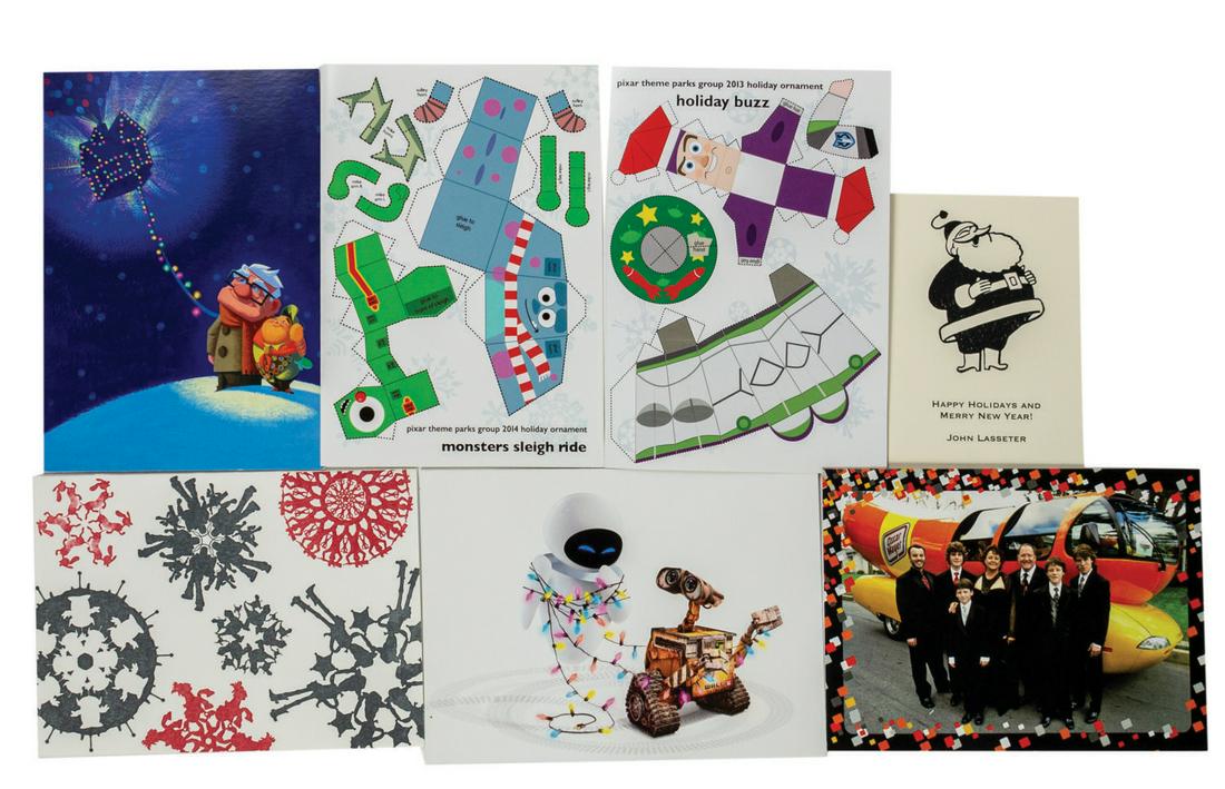 Set of (6) Pixar and (2) John Lasseter Christmas Cards.: (Pixar, 2007-14) A set of (6) Pixar Christmas cards and (2) John Lasseter family Christmas card sent to a former Pixar employee. The Pixar cards feature various characters from their classic animated 