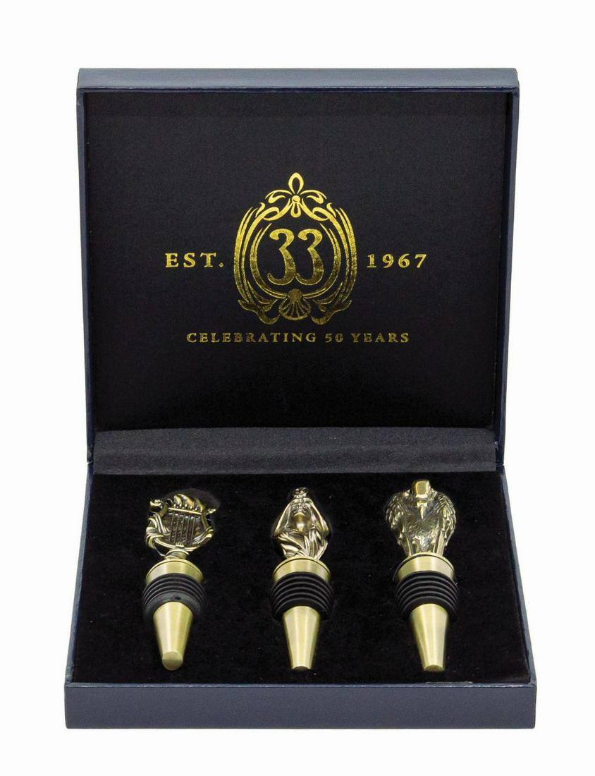 Club 33 50th Anniversary Wine Bottle Stoppers.: (Disneyland, 2017) A set of (3) wine bottle stoppers released to commemorate the 50th anniversary of the New Orleans Square members-only establishment and only available to Club 33 members. The metal 