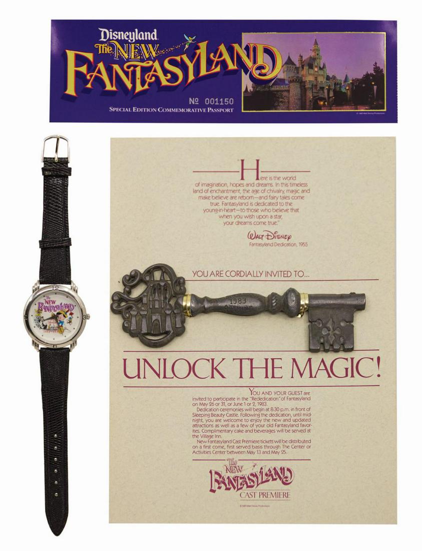 New Fantasyland Cast Premiere Key, Passport, and Watch.: (Disneyland, 1983/93) A collection of items from the New Fantasyland refurbishment of 1983. Included are a metal key with Sleeping Beauty Castle molded into the head, a New Fantasyland Special Edition