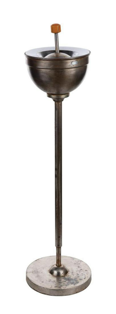 Walt Disney Studio Smoking Stand Ashtray.: (Disney, c.1940s) An original "smoking stand" ashtray, a once common feature of the Kem Weber furnished Walt Disney Studio offices in Burbank. The adjustable metallic smoking stand with spring-loaded