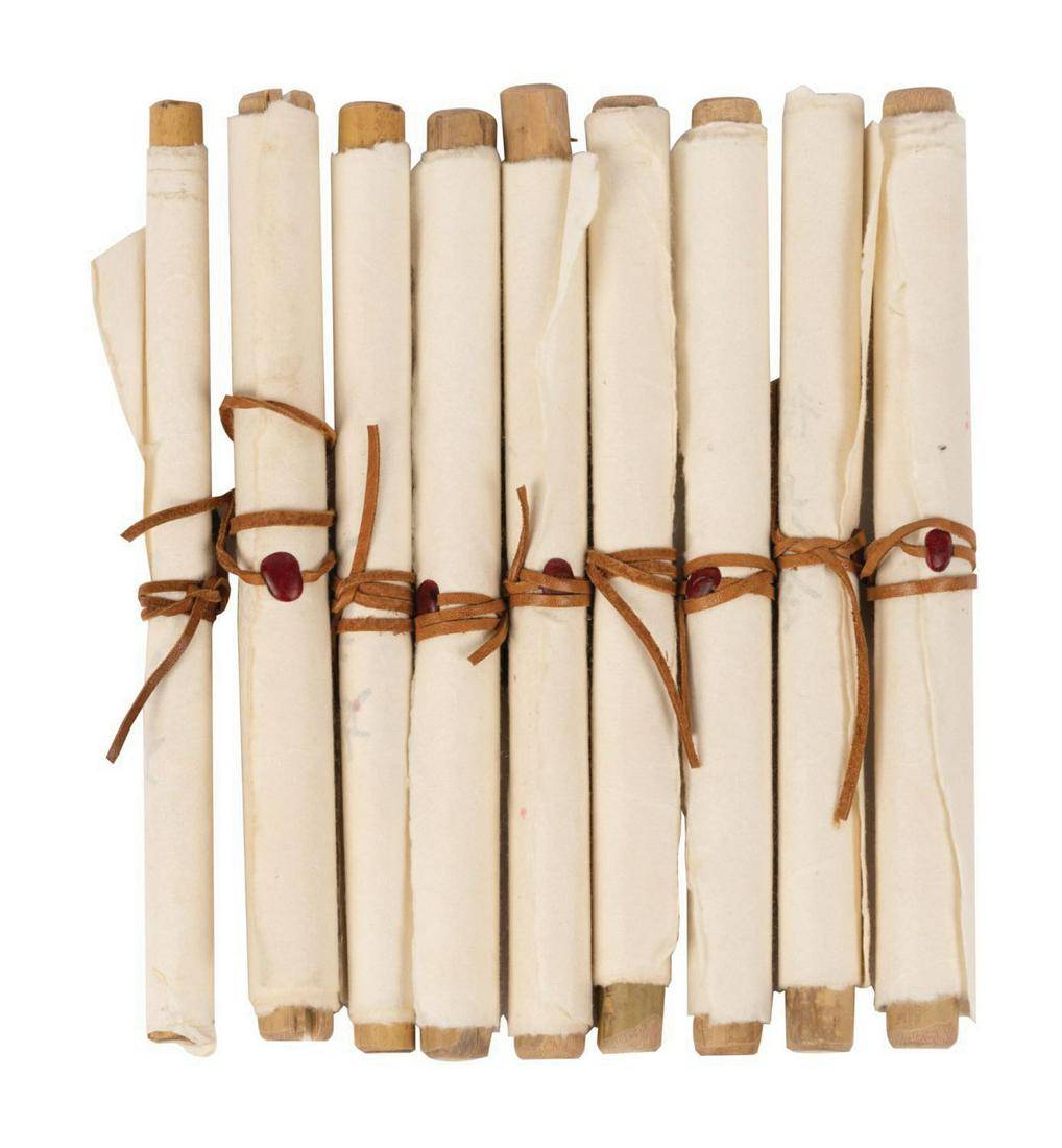 Set of (9) Mulan Prop Scrolls.: (Disney, 2020) A collection of (9) screen used production-made prop scrolls created for Walt Disney Pictures' live-action adaptation of Mulan. This style of scroll appears in scenes featuring Commande