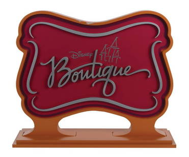 Disney Boutique Marquee Sign.: (Disneyland, c.2015-2018) The Disney Boutique marquee with its stylized Sleeping Beauty Castle emblem once directed fun-loving guests toward the modern clothing and accessories featuring a variety of