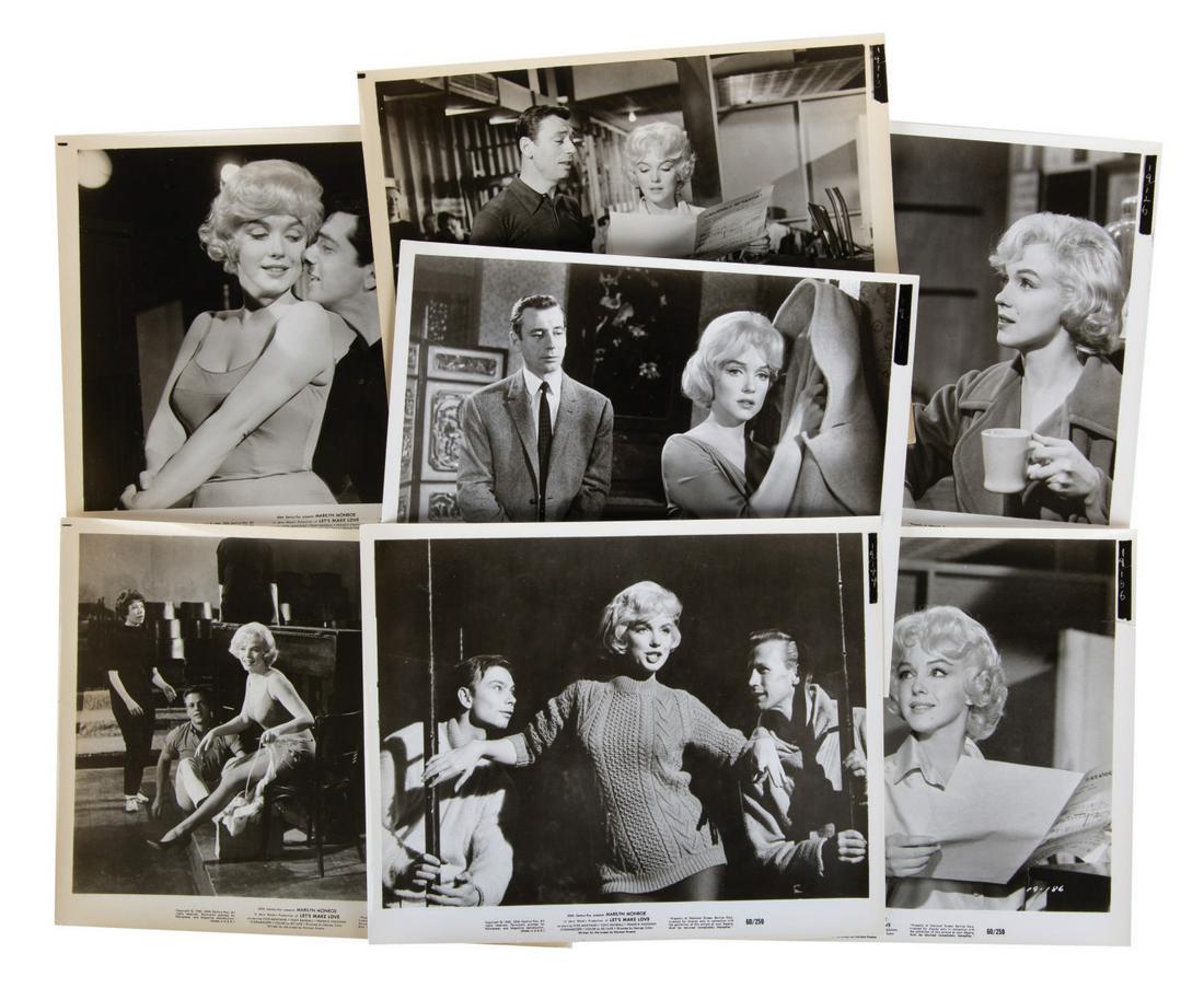 Collection of "Let's Make Love" Marilyn Monroe Photos.: (20th Century Fox, 1960) A collection of (7) publicity photos from "Let's Make Love" featuring Marilyn Monroe. The 8"x10" glossy prints are in good condition overall, with some wear and slight discolo