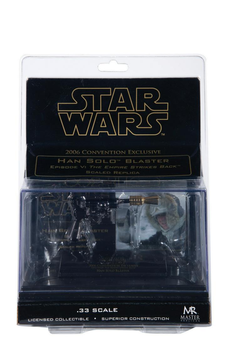 A Scaled Han Solo Blaster With Gold Flash Hider. (1 of 2)