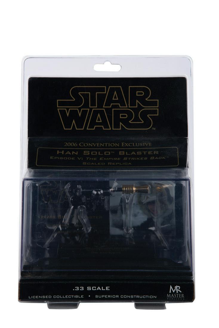A Scaled Han Solo Blaster With Gold Flash Hider. (1 of 2)