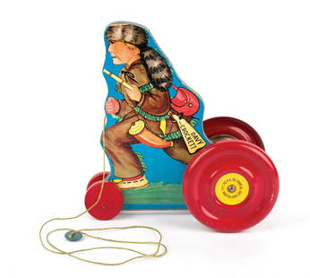 Davy Crockett Pull Toy.: (N.N. Hill Brass Co., 1950s) A hard-to-find Davy Crockett pull toy by the N.N. Hill Brass Co. Constructed of wood with metal rear wheels, the toy jingles when pulled. Measuring 9"x8.5", the toy is in