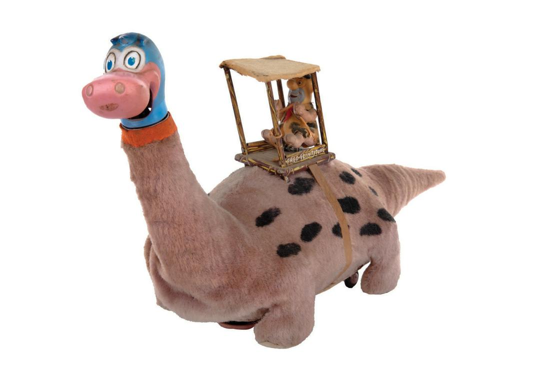 Fred Flintstone Riding Dinosaur Toy. (1 of 2)