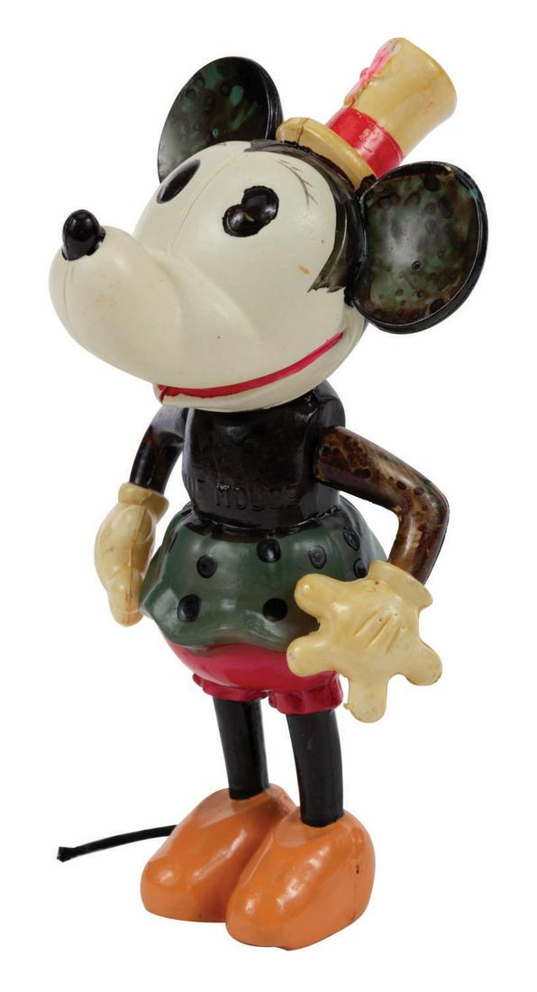 An Early Minnie Mouse Jointed Celluloid Figure. (1 of 2)