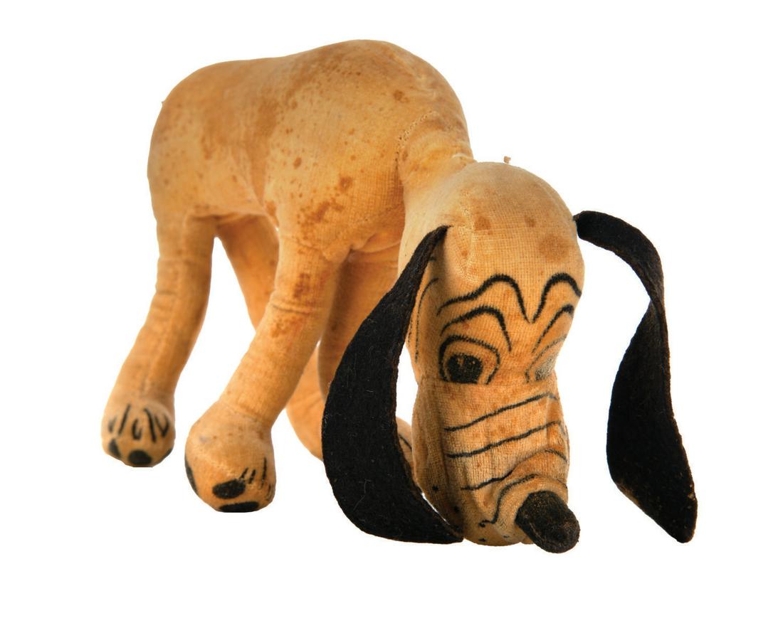 A Rare Pluto Doll by Dean's Rag Book Company.: (Dean's, 1930s) A rare Pluto doll manufactured by Dean's Rag Book Company. The stuffed velveteen doll of Mickey's pup features printed graphics of tongue and teeth inside mouth, and Dean's patent nota