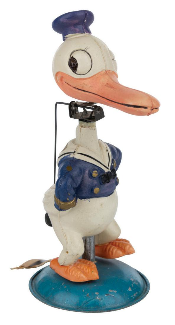 A Donald Duck Celluloid Nodder Wind-Up. (1 of 3)