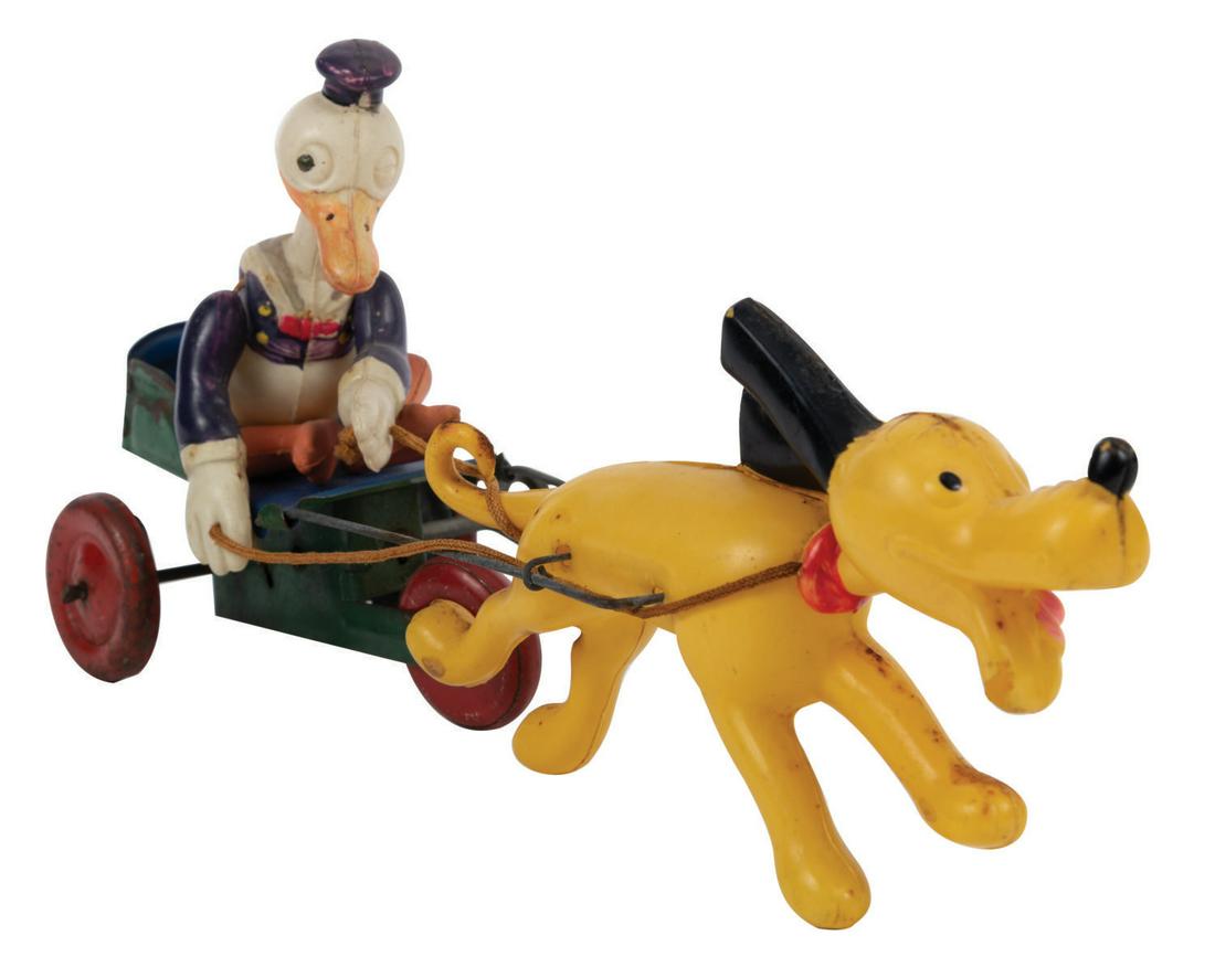 Pluto Pulling Donald Celluloid Wind-Up Toy (1 of 2)
