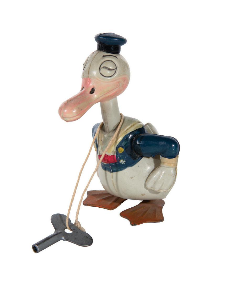 A Donald Duck Walking Celluloid Wind-Up Toy with Box. (1 of 4)