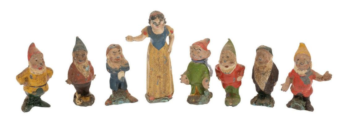 Snow White and the Seven Dwarfs Britains Figure Set.: (Britains, 1938) A set of painted lead figures of Snow White and the Seven Dwarfs made in England in 1938 by famed toy soldier manufacturer Britains. Snow White stands 2.25" tall and each dwarf is abo