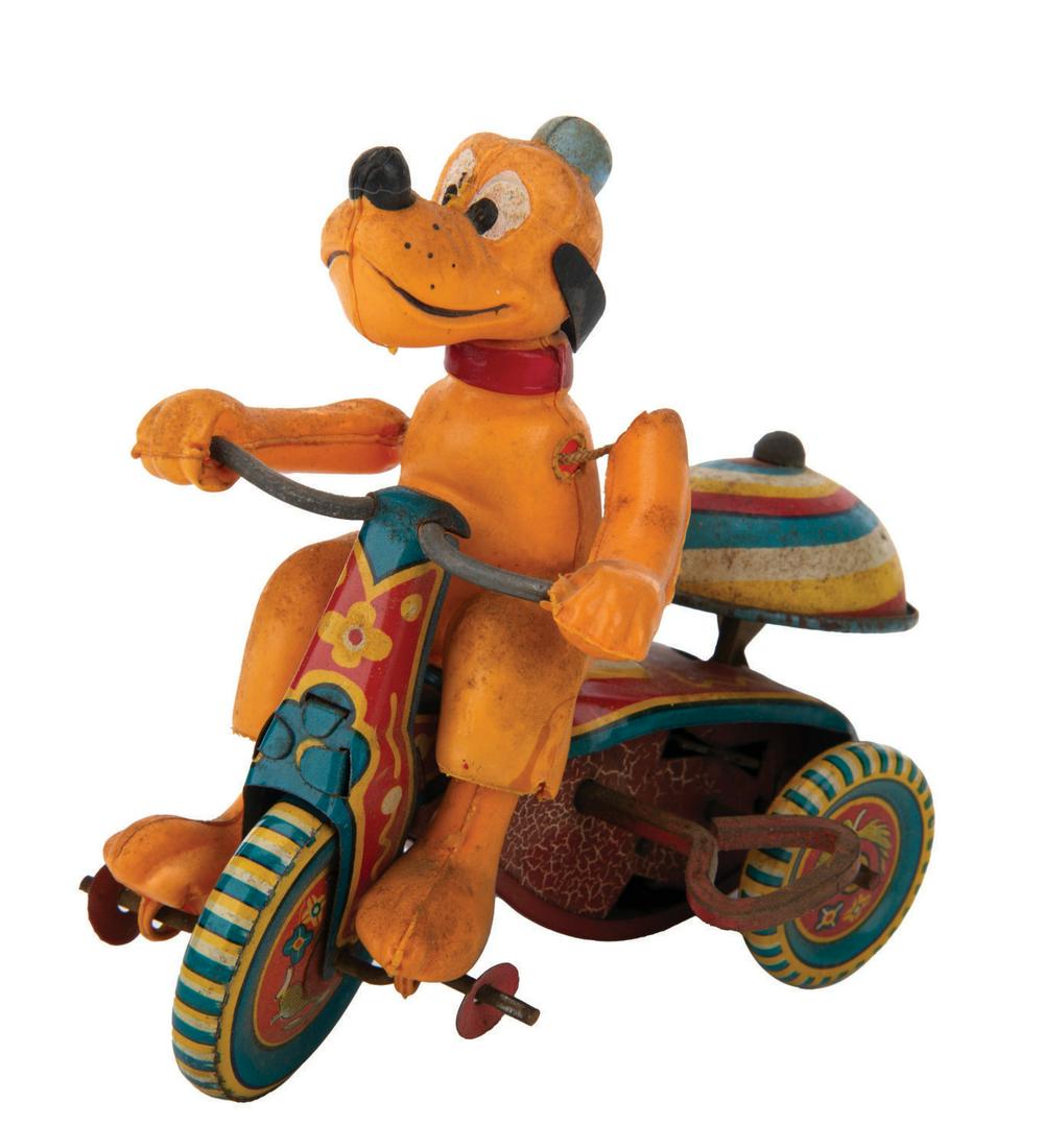 A Pluto Tricycle Wind-Up Toy by LineMar. (1 of 2)