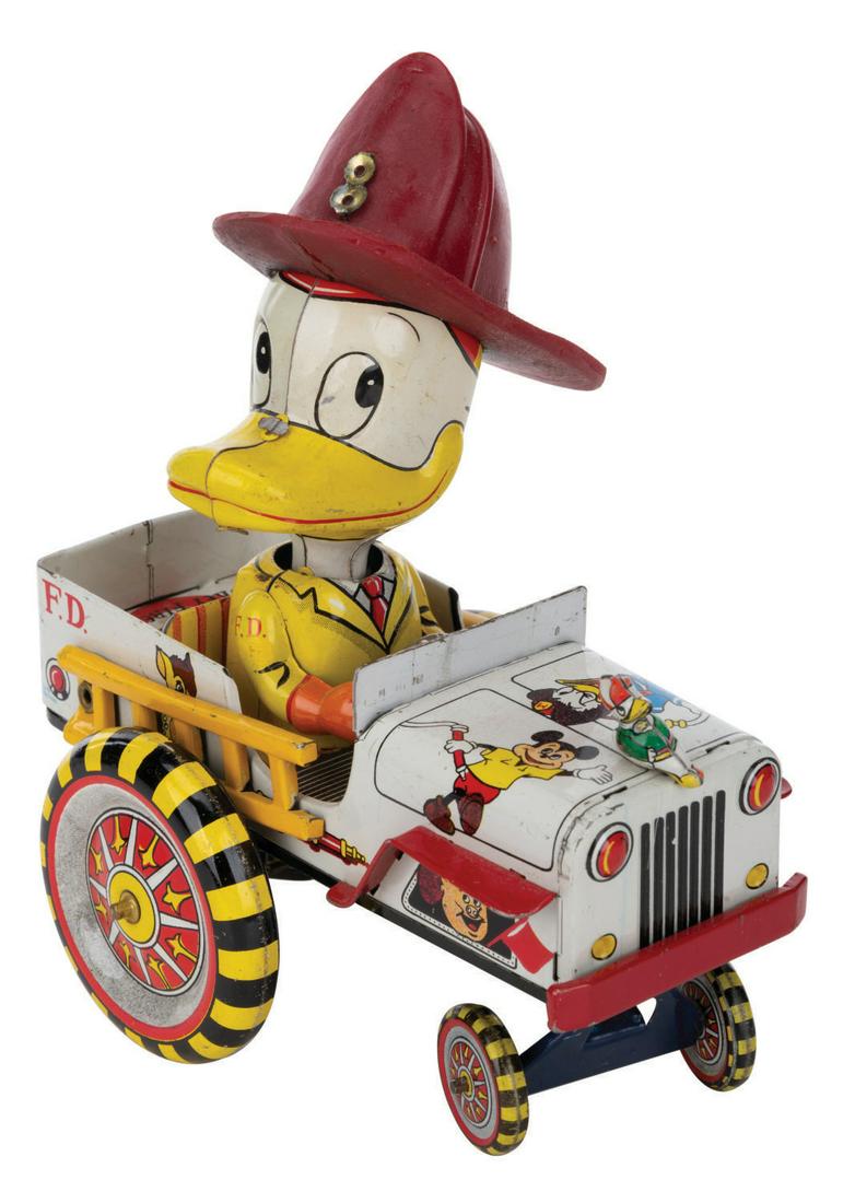A Rare Donald Duck Crazy Action Fire Truck by LineMar. (1 of 2)
