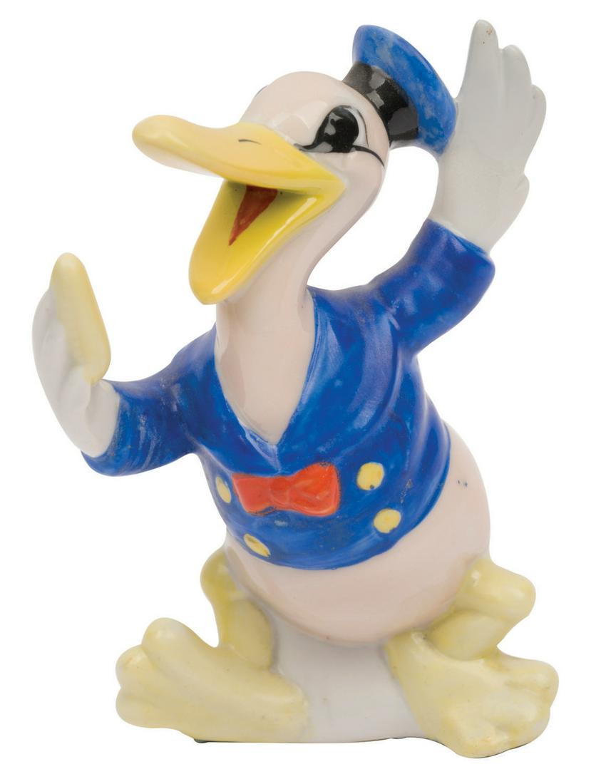 A Rare Donald Duck Porcelain Toothbrush Holder. (1 of 2)