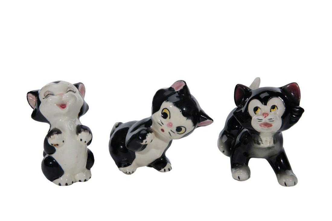 Collection of Figaro Ceramic Figurines.: (Brayton Laguna/Shaw, 1940/50s) A beautiful collection of (3) glazed ceramic Figaro figurines. Based on the character from Disney's "Pinocchio," the pieces are all about 4" tall. Two of the pieces wer