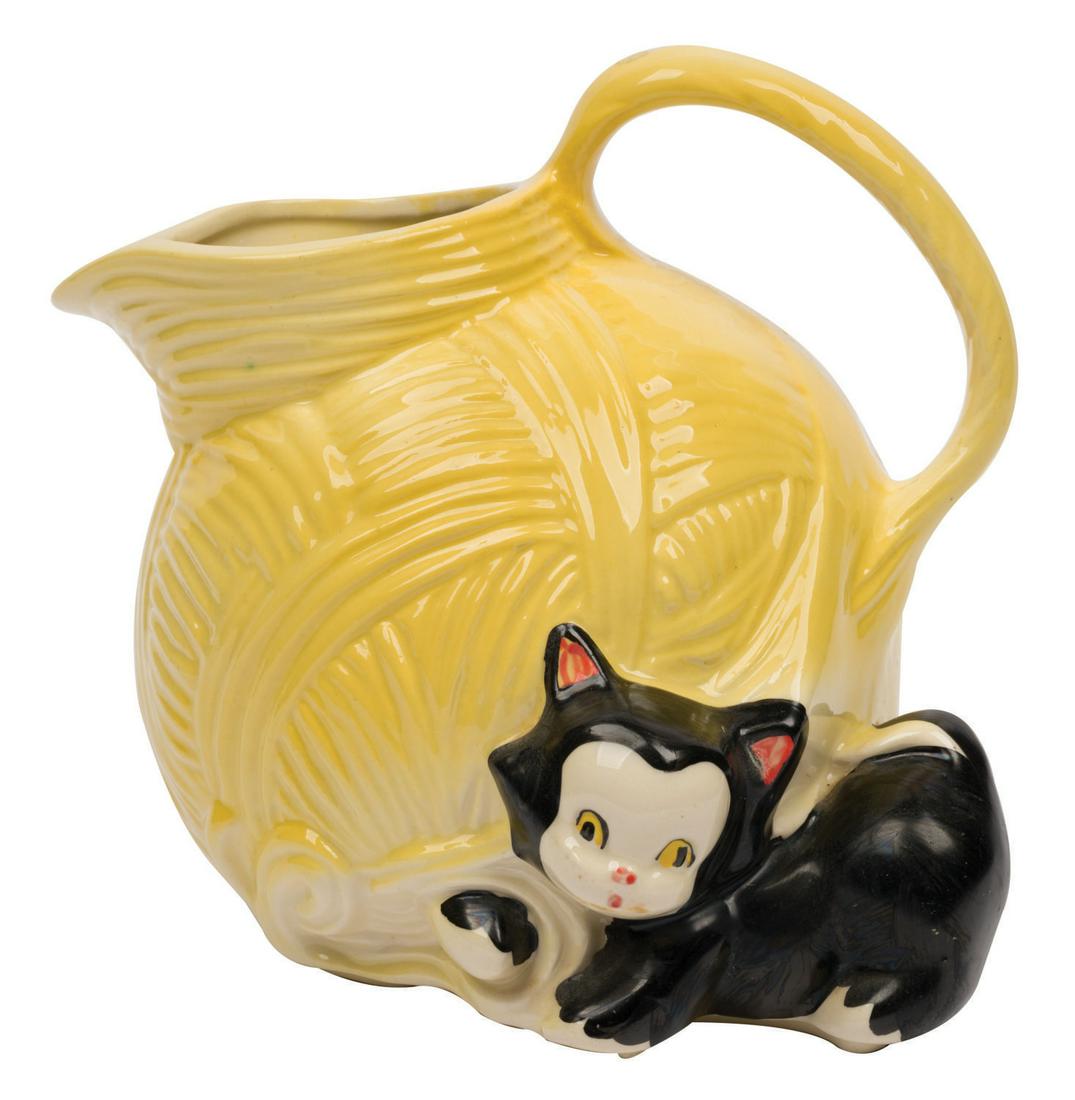 An American Bisque Figaro Ceramic Pitcher. (1 of 1)