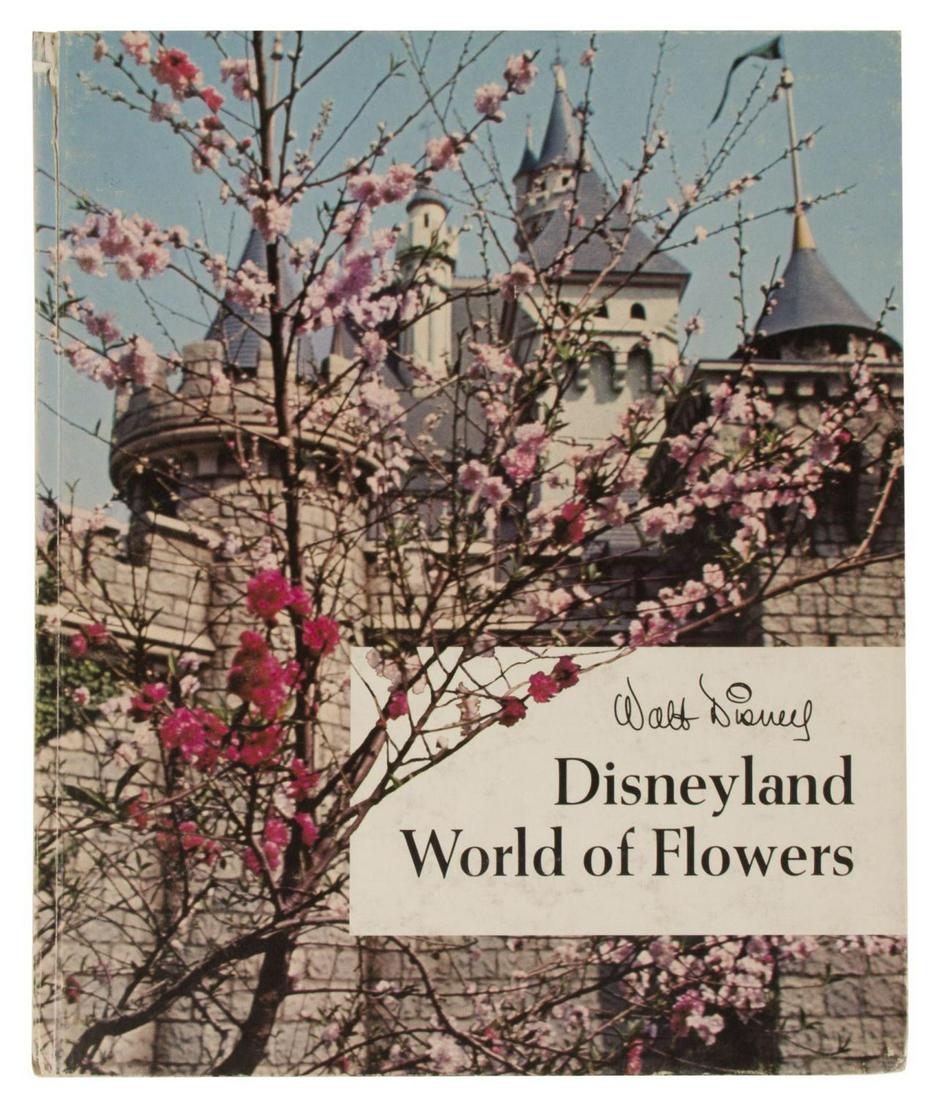 A Rare "Disneyland World of Flowers" Book.: (Disneyland, 1965) A very rare â€œDisneyland World of Flowers” hardcover souvenir book. This book was written by famed Disneyland horticulturist Morgan "Bill" Evans. This book was only publi