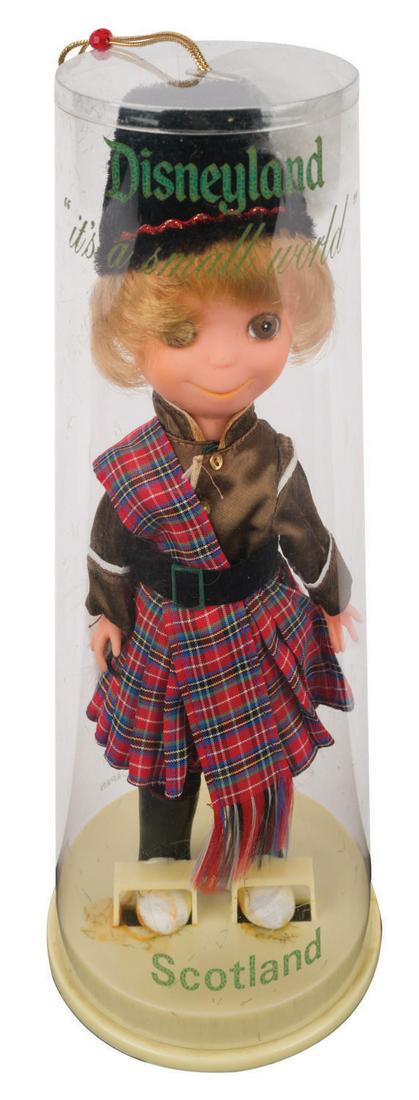 An Original It's a Small World Scotland Doll. (1 of 3)