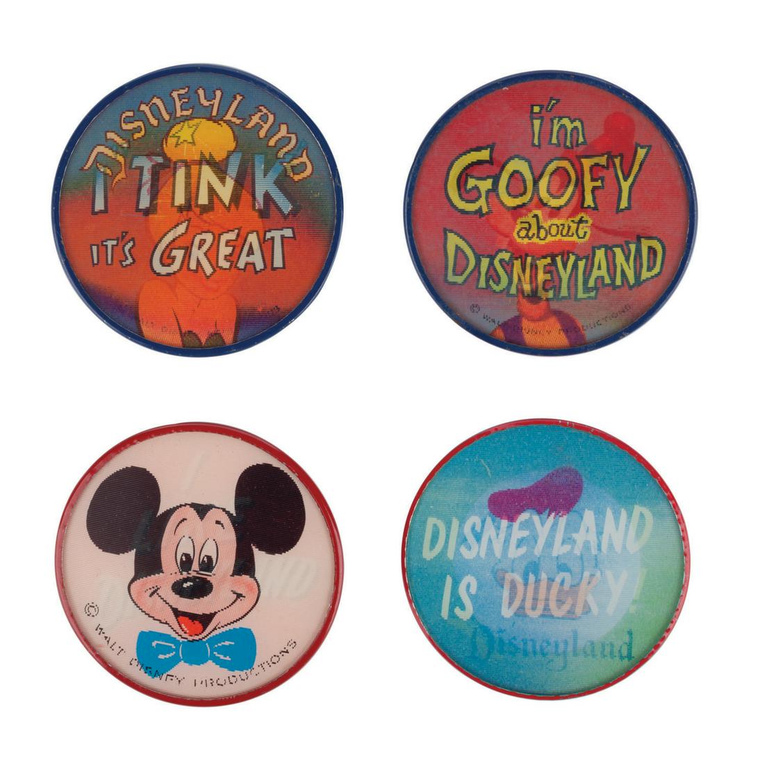 A Collection of (4) Disneyland Lenticular Buttons.: (Disneyland, 1960s) A collection of (4) lenticular buttons that change between images of Disney characters and phrases about Disneyland. The buttons depict Mickey, Donald, Goofy and Tinker Bell. Measu