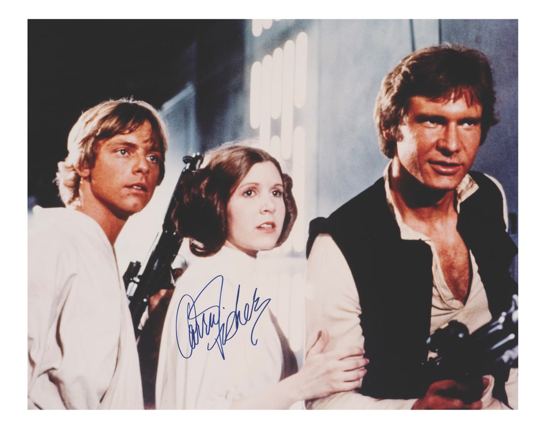 An Oversized Star Wars Photo Signed By Carrie Fisher. (1 of 2)