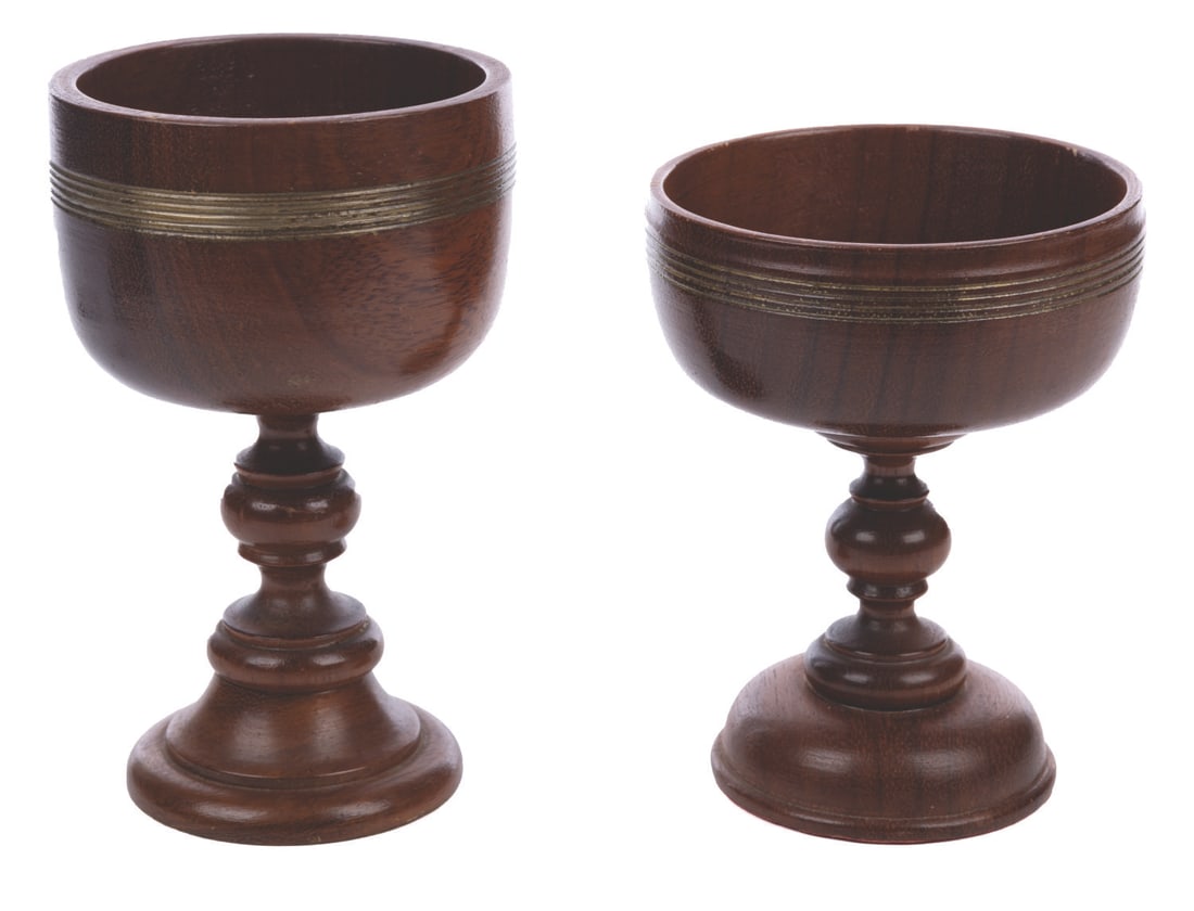 A Pair of Prototype Indiana Jones False Grail Goblets.: (Paramount, 1989) A pair of prototype false grail goblets from Indiana Jones and the Last Crusade. These were intended to be developed into jeweled false grails for the film. This pair is painted with