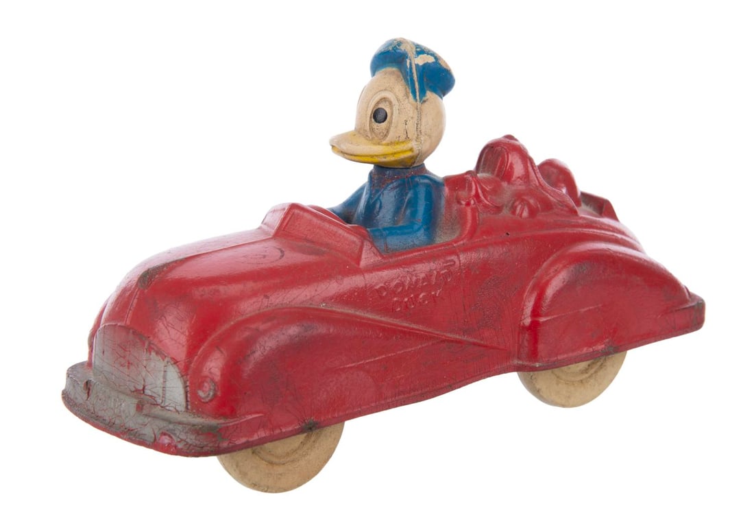 A Donald Duck & Pluto Toy Car. (1 of 4)