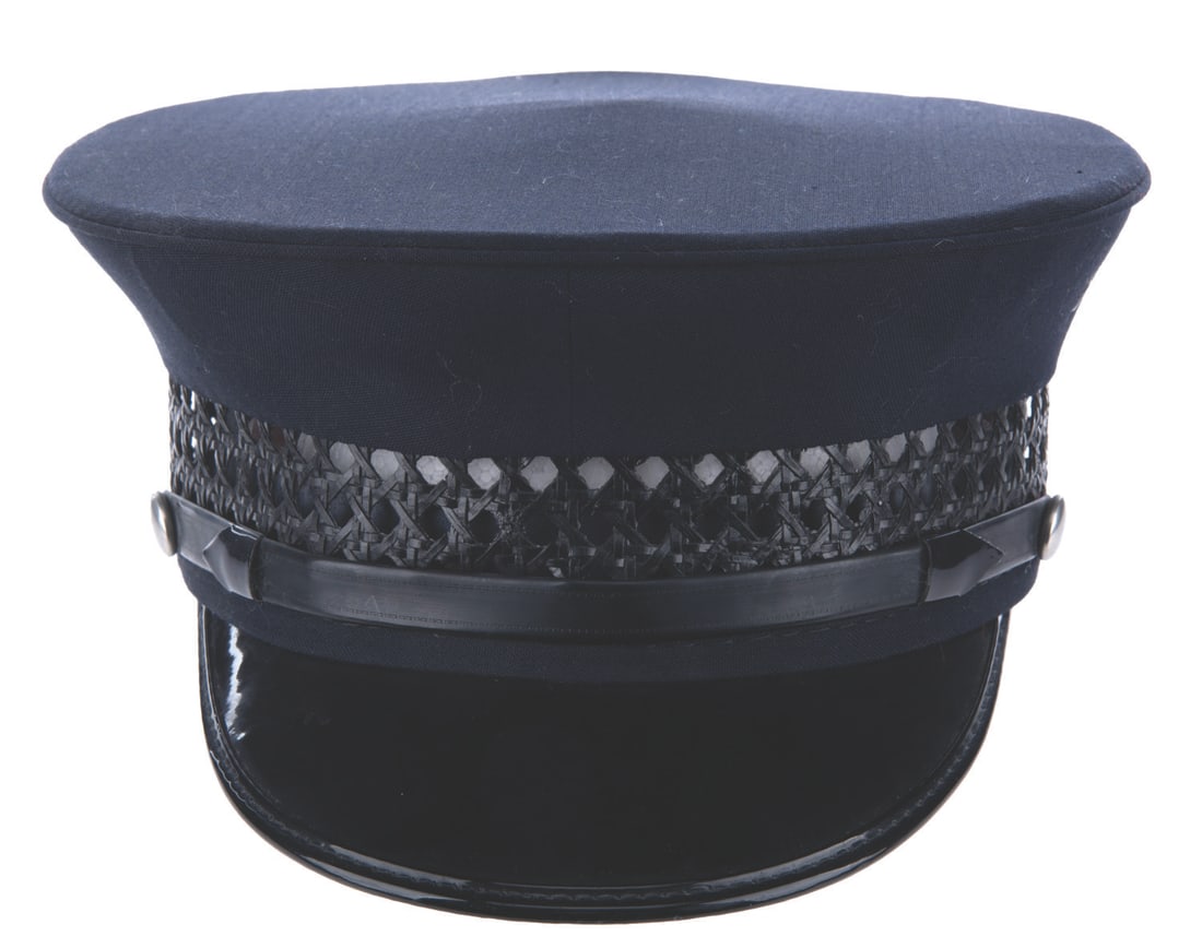 A Main Street Transportation Cast Member Hat.: (Disneyland, 2000s) A Main Street Transportation Cast Member Hat. This hat is of the style worn by Main Street Transportation Company Hosts and Hostesses of the Disneyland Horseless Carriages, Fire En