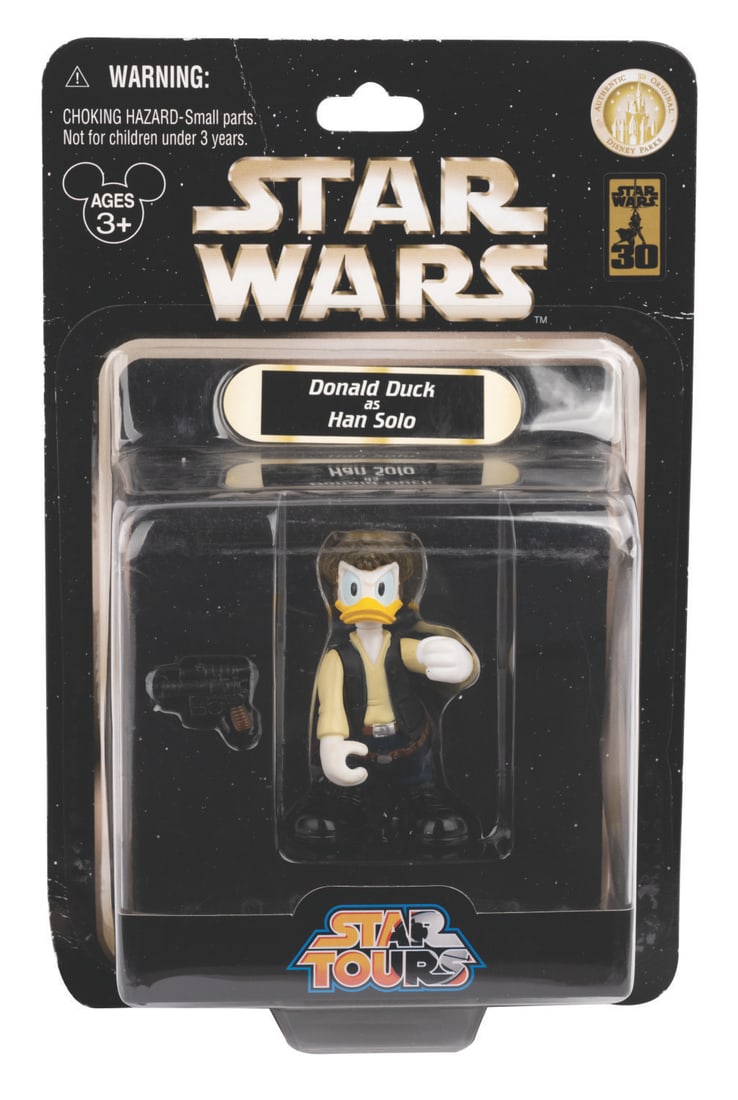 A Star Tours Donald Duck as Han Solo Action Figure. (1 of 2)