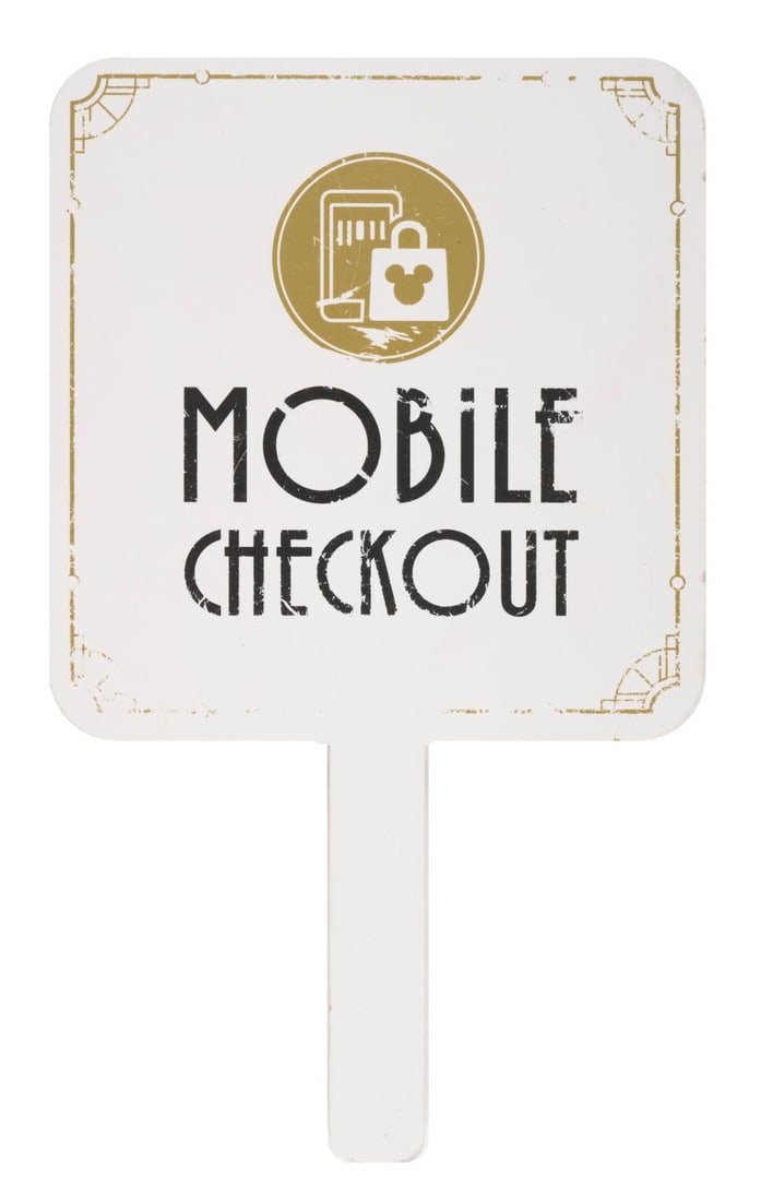 A Walt Disney World Mobile Check-Out Handheld Sign.: (WDW Resorts, 2000s) A Walt Disney World Handheld Mobile Checkout Sign. The back has a QR code that leads to the Walt Disney World My Disney Experience Ap. Measuring 10.5"x17.75", the sign is in fair