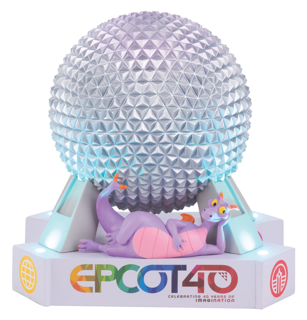 An Epcot 40th Anniversary Spaceship Earth Figure.: (EPCOT, 2022) An EPCOT 40 Spaceship Earth and Figment Statue. The statue celebrates 40 Years of Imagination and was designed by Disney Artist Costa Alavezos. Measuring 8.5" tall and 8" in diameter, th