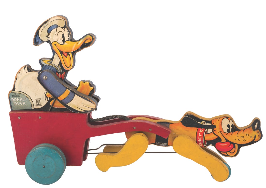 A Fisher-Price Dogcart Donald Toy. (1 of 3)