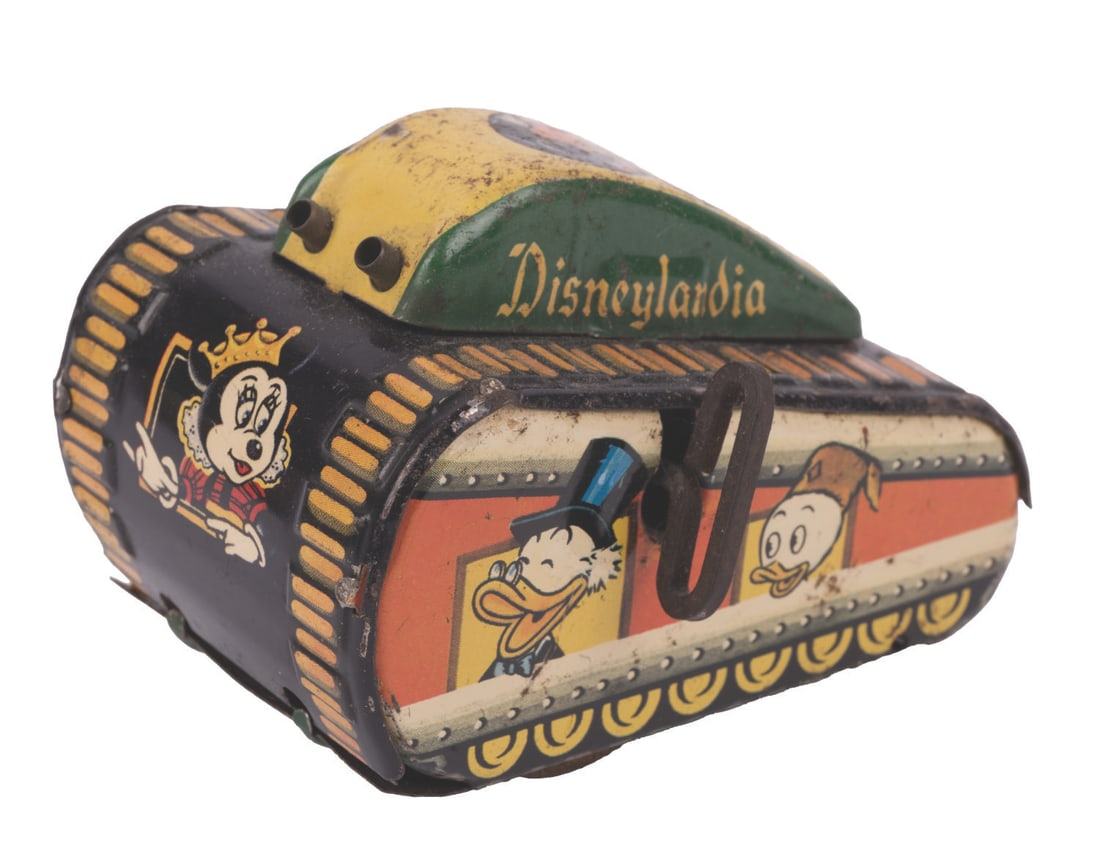 A Disneylandia Turn-Over Tin Tank Toy. (1 of 6)