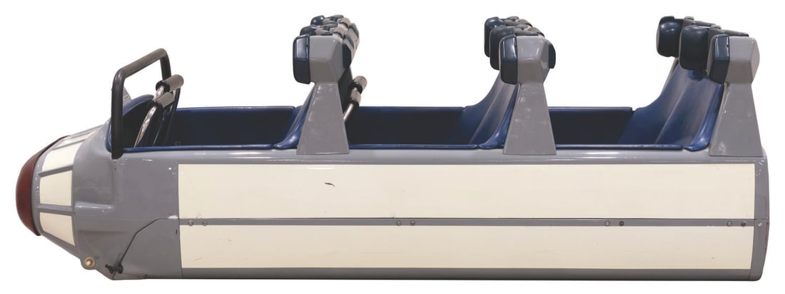 A Space Mountain Ride Vehicle.: (Disneyland, 1977) An original ride vehicle from Space Mountain in Disneyland. One of the most sought-after Park vehicles, this futuristic rocket ship features glow-in-the-dark side panels and an eye-