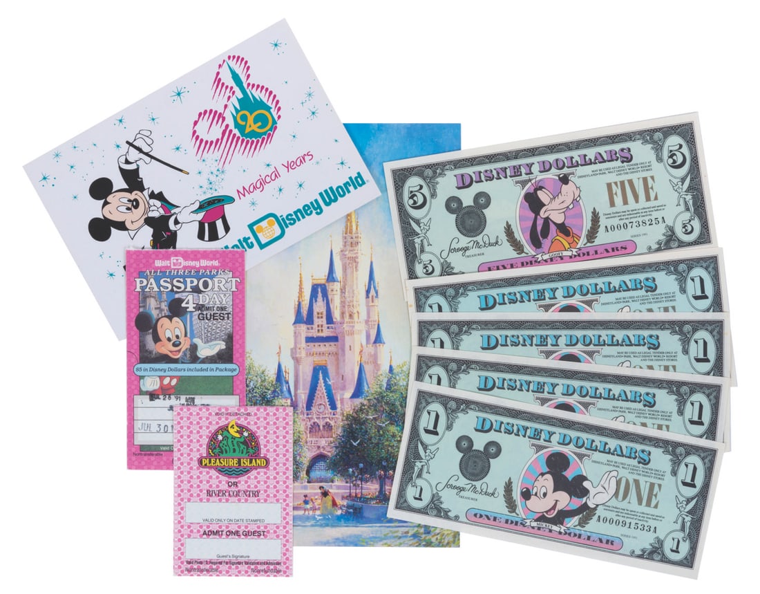 A Walt Disney World 20th Anniversary Collection.: (Walt Disney World, 1991) A collection of nine souvenirs from the "20 Magical Years" celebration at Walt Disney World. Included are four $1 Disney Dollar bills, one $5 Disney Dollar bill, two postcard