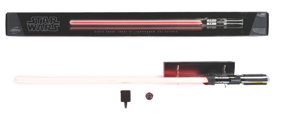 A Signature Series Darth Vader Force FX Lightsaber. (1 of 3)