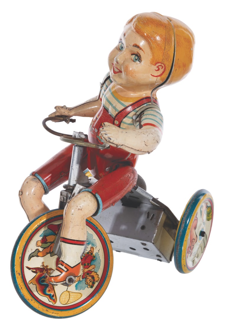 A Kiddy Cyclist Wind-Up Toy. (1 of 7)