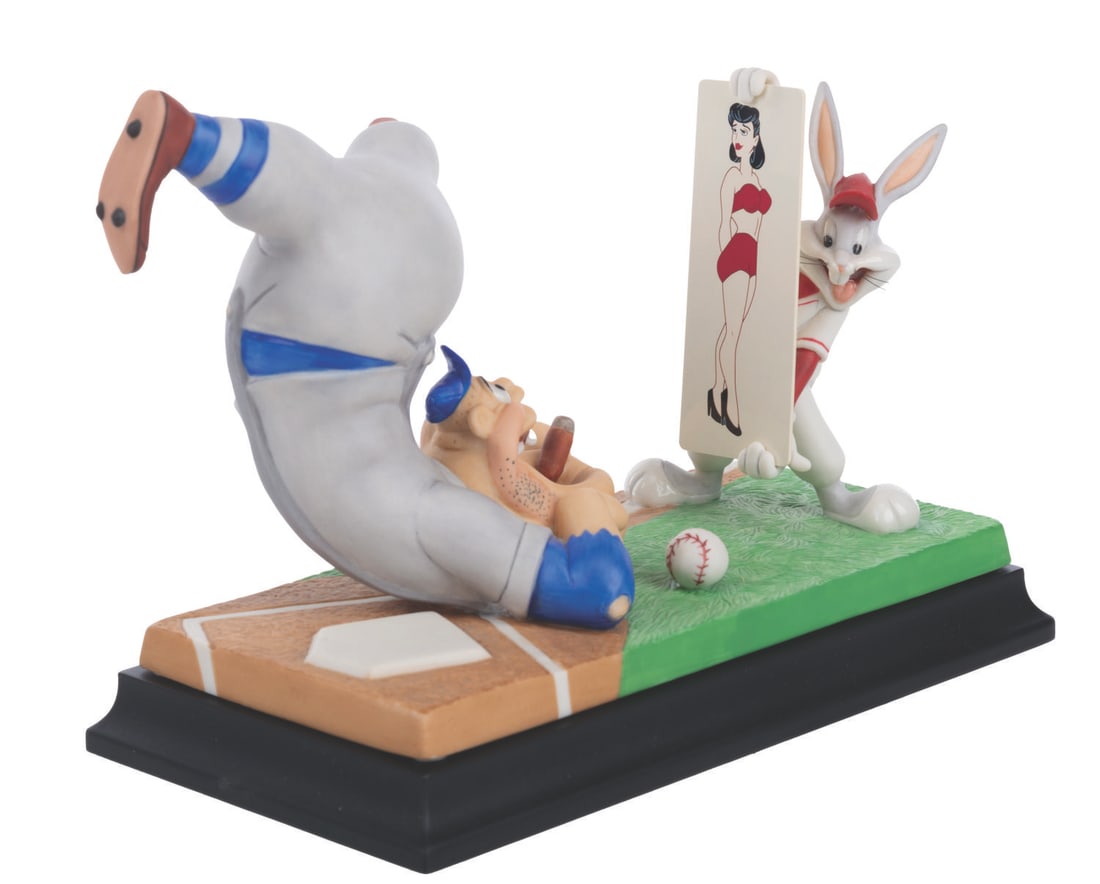 A Bugs Bunny "Dis Guy's a Pushover" Goebel Figure.: (Goebel, 1998) A Warner Bros. “Looney Tunes” Spotlight Collection figure featuring Bugs Bunny. Titled “Dis Guy’s a Pushover,” the figure is inspired by a similar scene in the 1946 sh