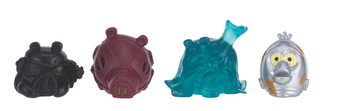 An Unproduced Set of Star Wars Angry Birds Telepods.: (Hasbro, 2000s) A set of four unproduced Star Wars Angry Birds Telepods. Telepods were tiny figurines with a QR code on the bottom allowing the user to ?teleport? that figurine?s character into an Ang