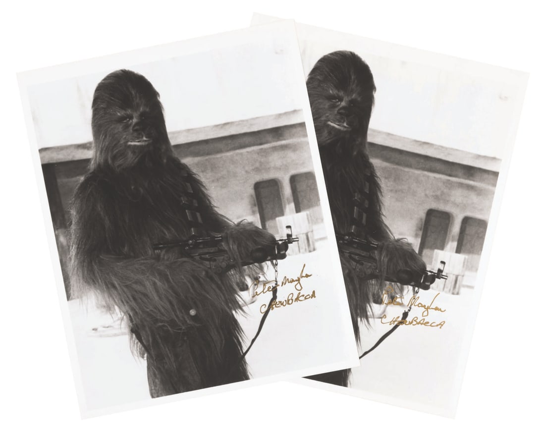 A Pair of Peter Mayhew Signed Chewbacca Photos. (1 of 4)