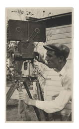 An Original Photo of Walt Disney with his Camera.
