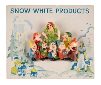 A Hand-Painted Celluloid Snow White and Dwarfs Pin.
