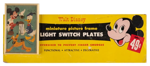 A Disney Light Switch Plate Display Sign.